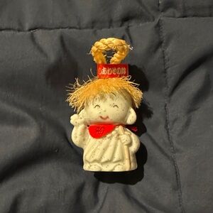 Charming Ceramic Figurine with Straw Hat